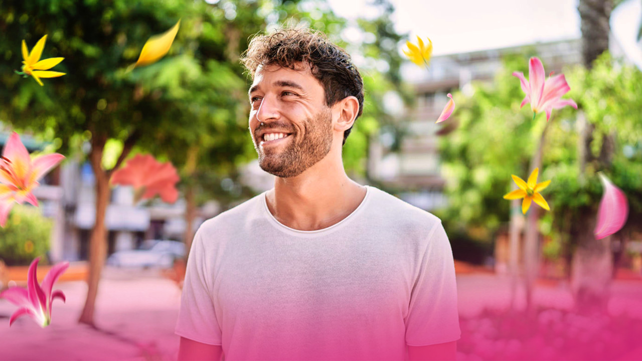 Man smiling in the street